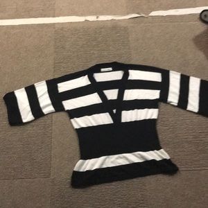 Black and white striped V-neck sweater